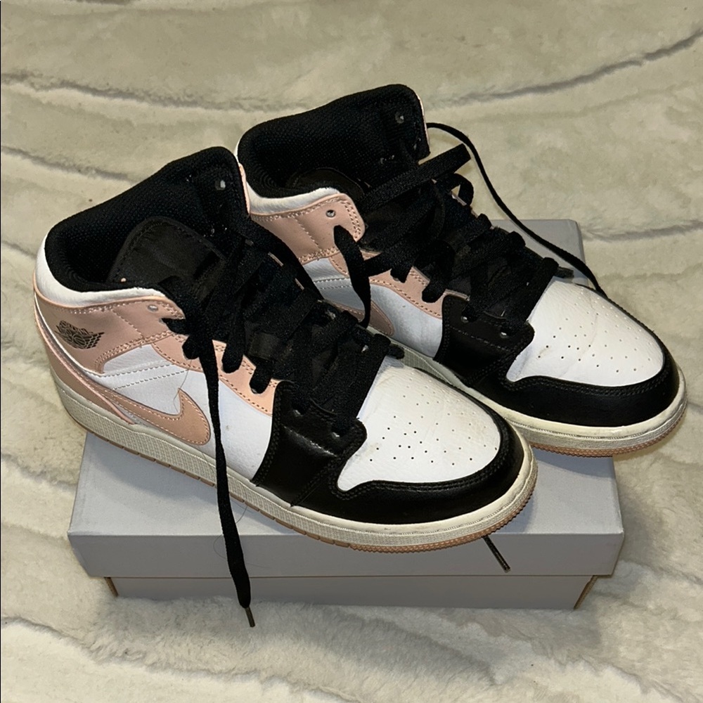 Pink and black Nike Jordans